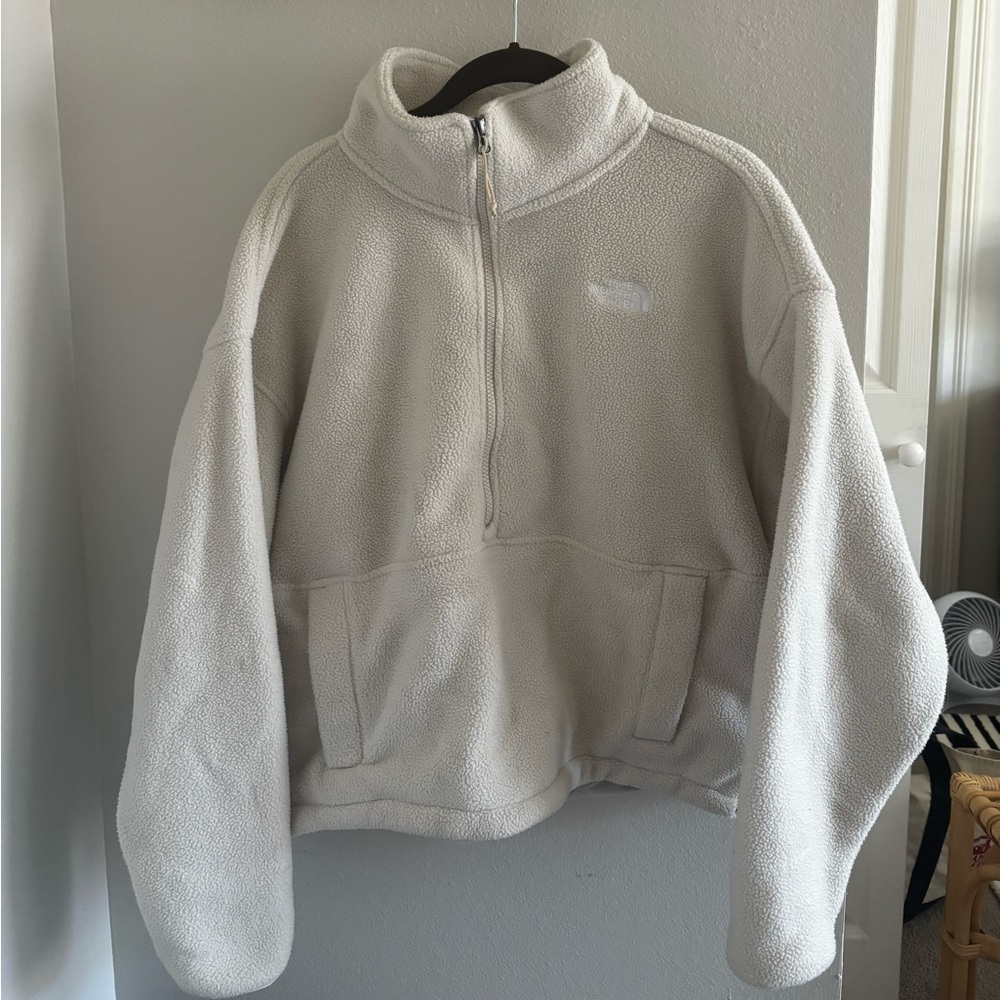 White Northface fleece pullover, size women’s medium.